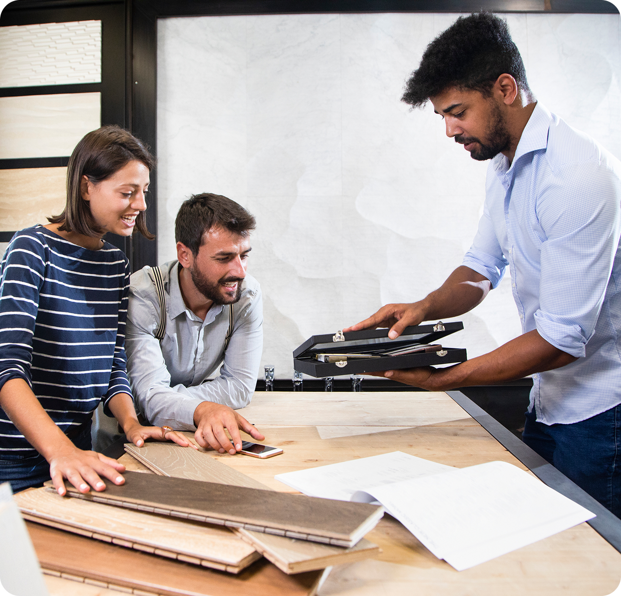 People reviewing interior design samples