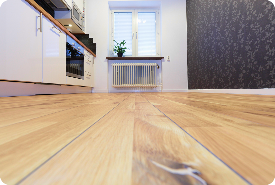 Modern kitchen interior with wooden floor